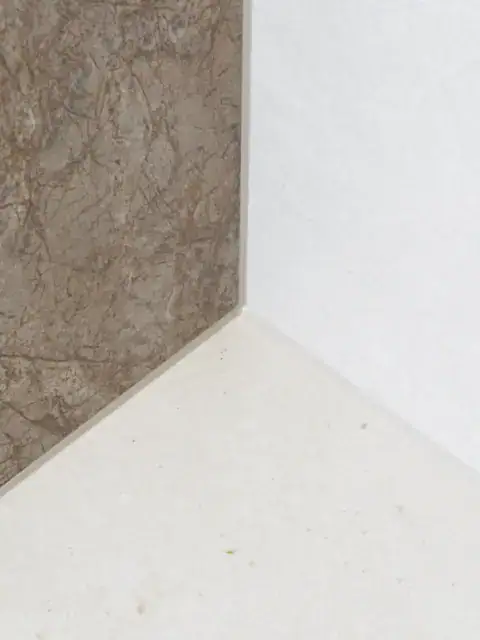 kitwerk vloer wand aansluitingen in douche natuursteen